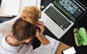 Marketing Worker frustrated on her laptop