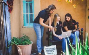 Three LTDM employees work in Old Town, Albuquerque